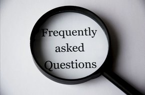 Magnifying Glass Over FAQ Text