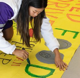 ASB student painting sign