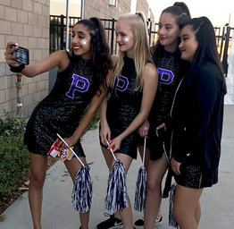 girls smiling for a selfie