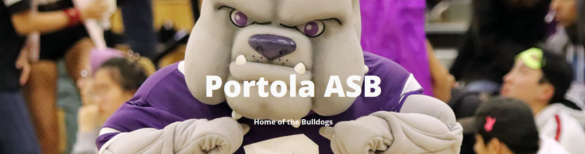 Mascot of bulldog pointing to himself