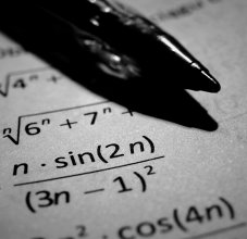 math equation with pen