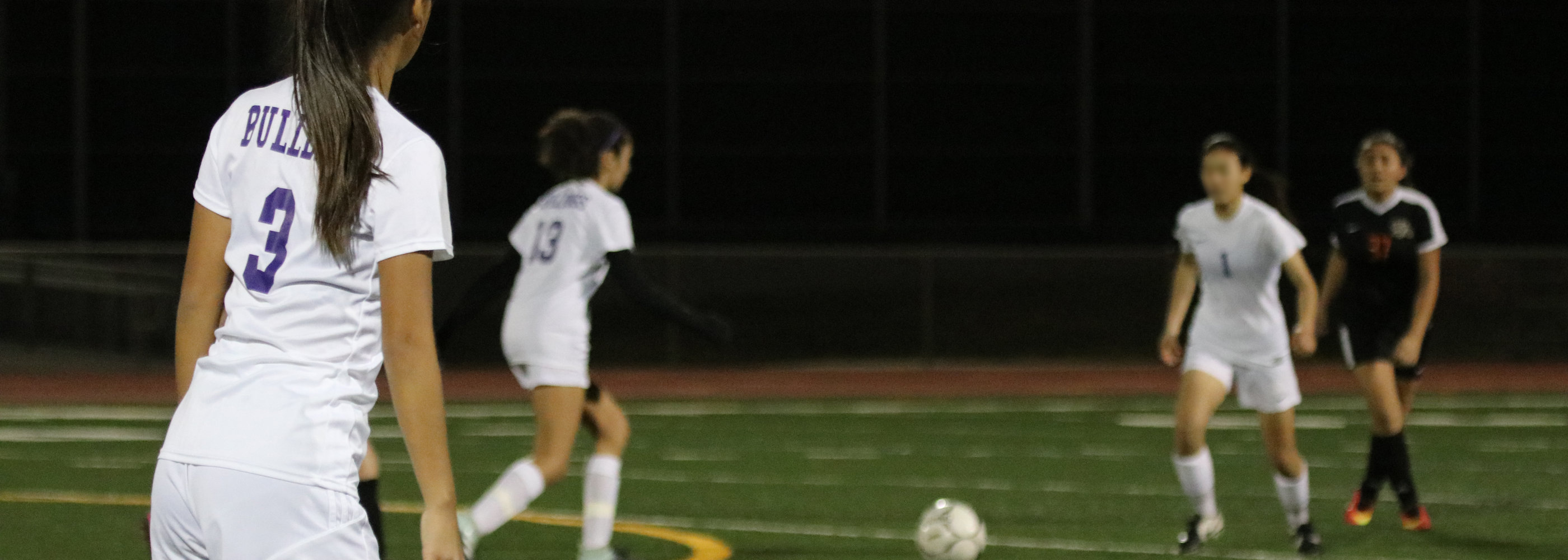 Girls playing soccer