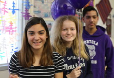 students smiling in class
